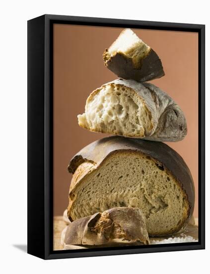 Rustic Bread, Two Loaves with Pieces Cut Off in a Pile-null-Framed Premier Image Canvas