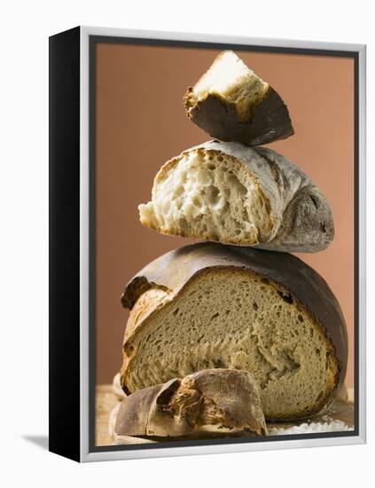 Rustic Bread, Two Loaves with Pieces Cut Off in a Pile-null-Framed Premier Image Canvas