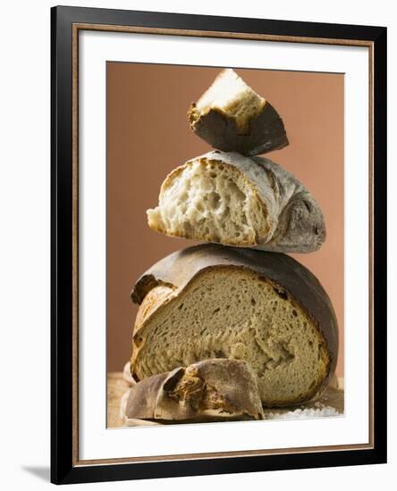 Rustic Bread, Two Loaves with Pieces Cut Off in a Pile-null-Framed Photographic Print