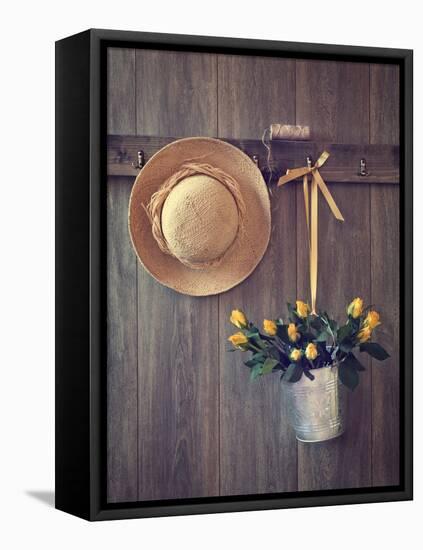 Rustic Shed Door with Hanging Straw Hat and Bucket of Yellow Roses-Chris_Elwell-Framed Premier Image Canvas