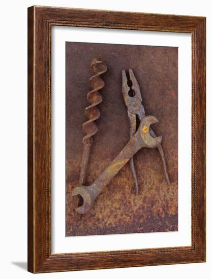 Rusty Old Double-headed Spanner Lying Next To Large Drill Bit And Rusty Pliers On Rusty Metal Sheet-Den Reader-Framed Photographic Print