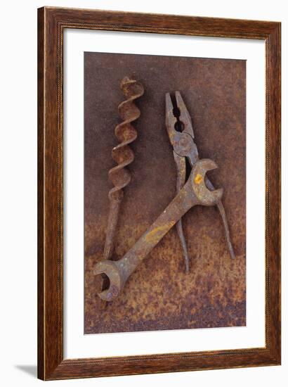 Rusty Old Double-headed Spanner Lying Next To Large Drill Bit And Rusty Pliers On Rusty Metal Sheet-Den Reader-Framed Photographic Print