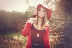 Young Woman Outdoors Wearing a Red Hat-Sabine Rosch-Mounted Photographic Print