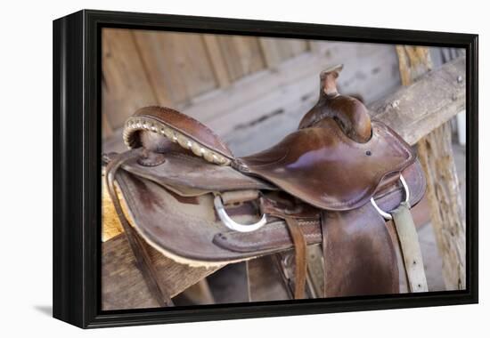 Saddle resting on the railing, Tucson, Arizona, USA.-Julien McRoberts-Framed Premier Image Canvas