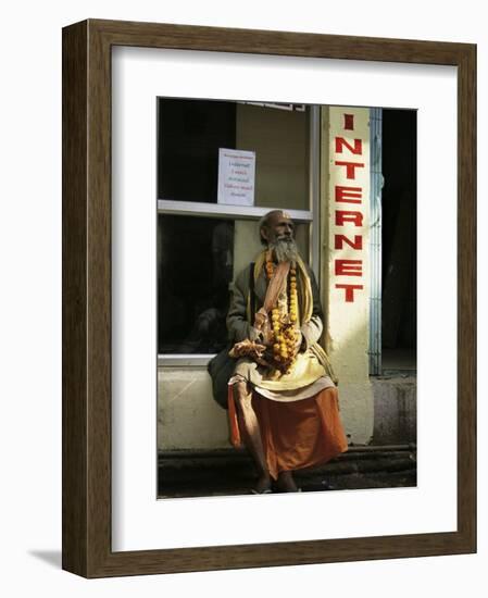 Sadhu Sitting Outside an Internet Cafe, Varanasi, Uttar Pradesh State, India-James Gritz-Framed Photographic Print