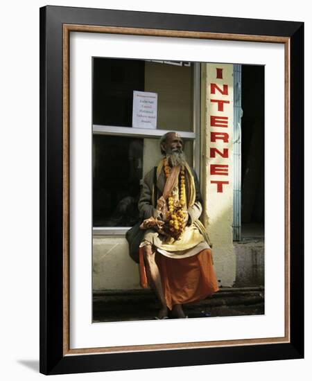 Sadhu Sitting Outside an Internet Cafe, Varanasi, Uttar Pradesh State, India-James Gritz-Framed Photographic Print