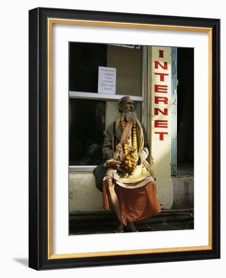 Sadhu Sitting Outside an Internet Cafe, Varanasi, Uttar Pradesh State, India-James Gritz-Framed Photographic Print