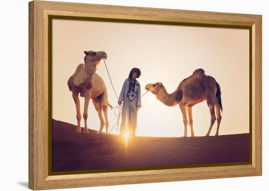 Sahara Desert, Morocco. Silhouette on the Dunes at Sunset.-Marco Bottigelli-Framed Premier Image Canvas