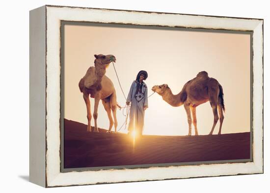 Sahara Desert, Morocco. Silhouette on the Dunes at Sunset.-Marco Bottigelli-Framed Premier Image Canvas