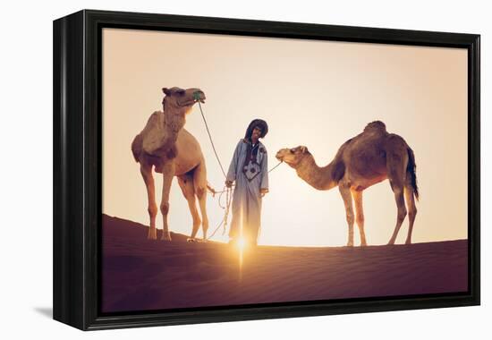 Sahara Desert, Morocco. Silhouette on the Dunes at Sunset.-Marco Bottigelli-Framed Premier Image Canvas