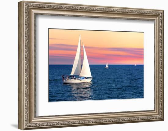Sailboat Sailing towards Sunset on a Calm Evening-elenathewise-Framed Photographic Print