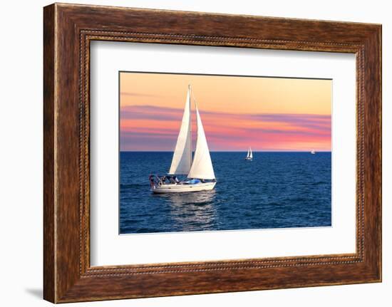 Sailboat Sailing towards Sunset on a Calm Evening-elenathewise-Framed Photographic Print