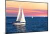 Sailboat Sailing towards Sunset on a Calm Evening-elenathewise-Mounted Photographic Print