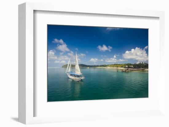 Sailing boat anchoring on Mana Island, Mamanuca Islands, Fiji, South Pacific-Michael Runkel-Framed Photographic Print