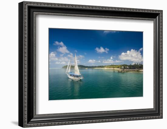 Sailing boat anchoring on Mana Island, Mamanuca Islands, Fiji, South Pacific-Michael Runkel-Framed Premium Photographic Print
