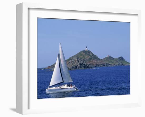 Sailing Boat with the Semaphore Lighthouse Behind, Iles Sanguinaires, Island of Corsica, France-Thouvenin Guy-Framed Photographic Print