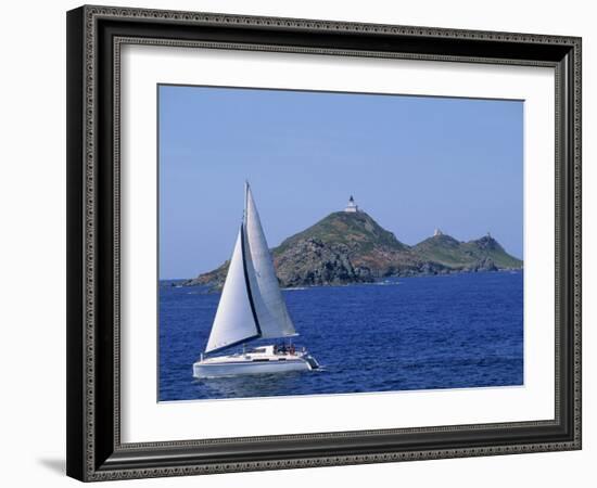 Sailing Boat with the Semaphore Lighthouse Behind, Iles Sanguinaires, Island of Corsica, France-Thouvenin Guy-Framed Photographic Print
