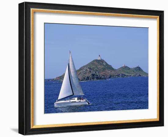 Sailing Boat with the Semaphore Lighthouse Behind, Iles Sanguinaires, Island of Corsica, France-Thouvenin Guy-Framed Photographic Print