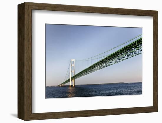 Sailing under the Mackinac Bridge in Mackinac Island, Michigan, USA-Joe Restuccia III-Framed Photographic Print