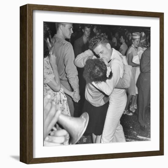 Sailor Kissing Pretty Girl amidst Jubilant Crowd in Celebration Regarding the End of WWII-Gordon Coster-Framed Photographic Print
