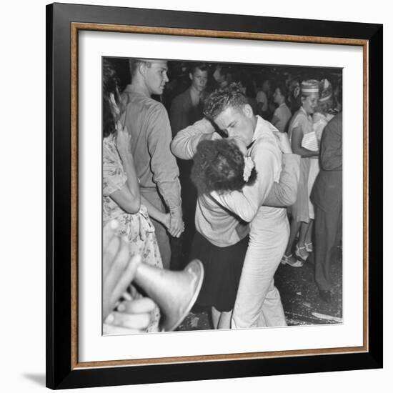 Sailor Kissing Pretty Girl amidst Jubilant Crowd in Celebration Regarding the End of WWII-Gordon Coster-Framed Photographic Print