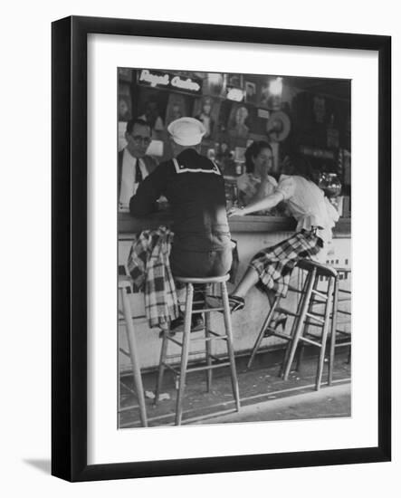 Sailor on Shore Leave Sitting at a Soda Fountain with Young Woman-Peter Stackpole-Framed Photographic Print