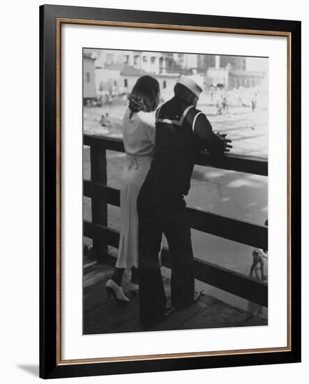 Sailor on Shore Leave Standing on Pier with a Young Woman-Peter Stackpole-Framed Photographic Print