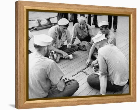 Sailors Aboard a Us Navy Cruiser at Sea Playing a Game of Dominoes on Deck During WWII-Ralph Morse-Framed Premier Image Canvas