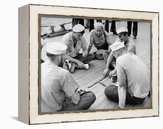 Sailors Aboard a Us Navy Cruiser at Sea Playing a Game of Dominoes on Deck During WWII-Ralph Morse-Framed Premier Image Canvas