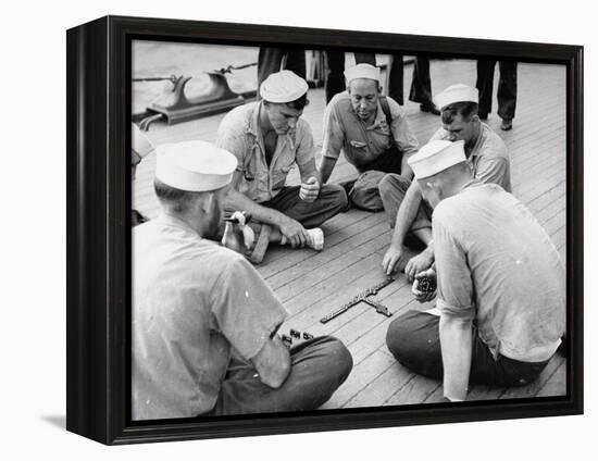 Sailors Aboard a Us Navy Cruiser at Sea Playing a Game of Dominoes on Deck During WWII-Ralph Morse-Framed Premier Image Canvas