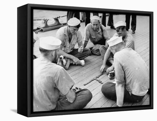Sailors Aboard a Us Navy Cruiser at Sea Playing a Game of Dominoes on Deck During WWII-Ralph Morse-Framed Premier Image Canvas