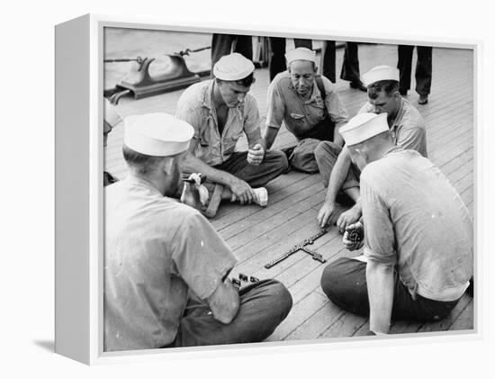 Sailors Aboard a Us Navy Cruiser at Sea Playing a Game of Dominoes on Deck During WWII-Ralph Morse-Framed Premier Image Canvas