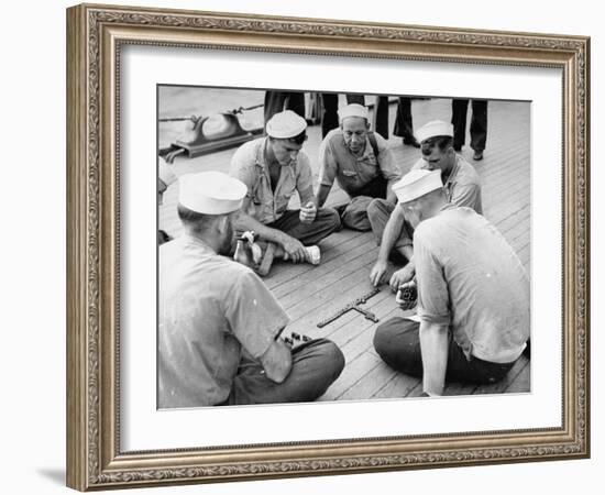 Sailors Aboard a Us Navy Cruiser at Sea Playing a Game of Dominoes on Deck During WWII-Ralph Morse-Framed Photographic Print