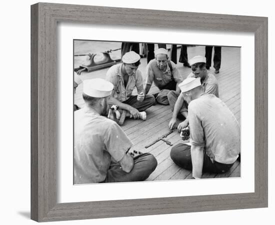 Sailors Aboard a Us Navy Cruiser at Sea Playing a Game of Dominoes on Deck During WWII-Ralph Morse-Framed Photographic Print