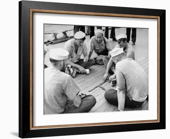 Sailors Aboard a Us Navy Cruiser at Sea Playing a Game of Dominoes on Deck During WWII-Ralph Morse-Framed Photographic Print