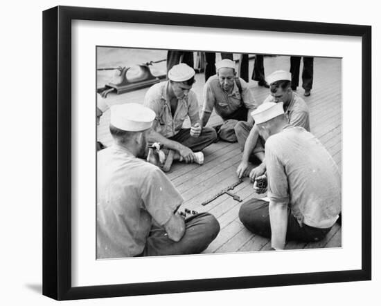 Sailors Aboard a Us Navy Cruiser at Sea Playing a Game of Dominoes on Deck During WWII-Ralph Morse-Framed Photographic Print