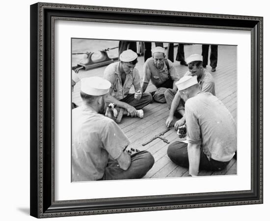 Sailors Aboard a Us Navy Cruiser at Sea Playing a Game of Dominoes on Deck During WWII-Ralph Morse-Framed Photographic Print