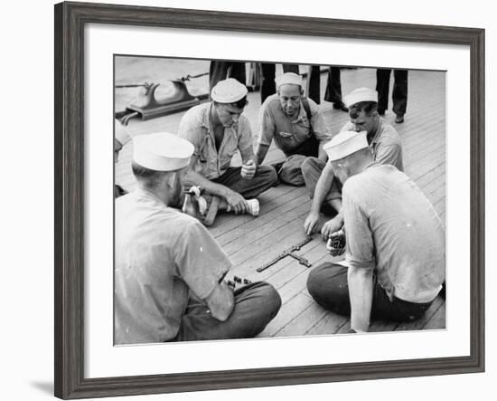 Sailors Aboard a Us Navy Cruiser at Sea Playing a Game of Dominoes on Deck During WWII-Ralph Morse-Framed Photographic Print