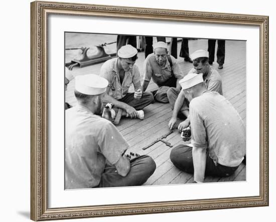 Sailors Aboard a Us Navy Cruiser at Sea Playing a Game of Dominoes on Deck During WWII-Ralph Morse-Framed Photographic Print