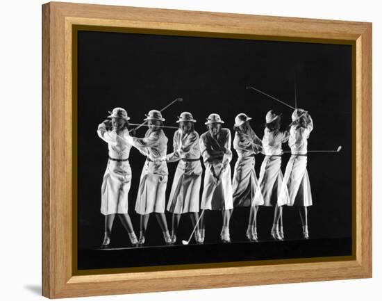 Saks Fifth Avenue Fashion Shot of Model Swinging Golf Club-Gjon Mili-Framed Premier Image Canvas