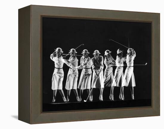 Saks Fifth Avenue Fashion Shot of Model Swinging Golf Club-Gjon Mili-Framed Premier Image Canvas