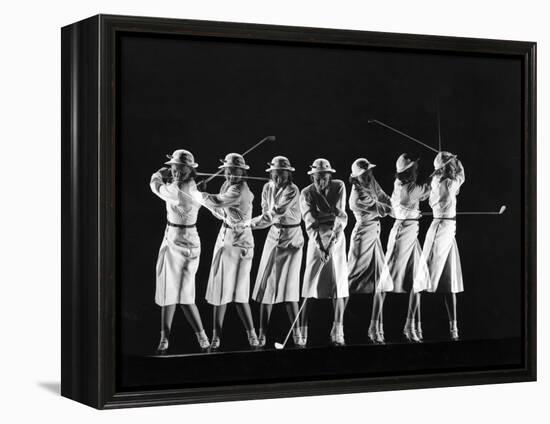 Saks Fifth Avenue Fashion Shot of Model Swinging Golf Club-Gjon Mili-Framed Premier Image Canvas