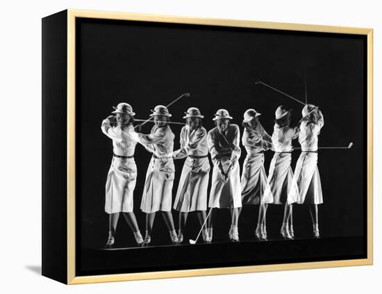 Saks Fifth Avenue Fashion Shot of Model Swinging Golf Club-Gjon Mili-Framed Premier Image Canvas