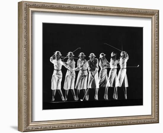 Saks Fifth Avenue Fashion Shot of Model Swinging Golf Club-Gjon Mili-Framed Photographic Print