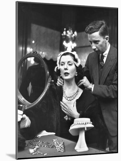 Salesman at Cartier's Showing a Diamond Necklace to Mrs. Julien Chaqueneau of New York Society-Alfred Eisenstaedt-Mounted Photographic Print