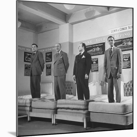 Salesmen Showing How Not to Test a Bed-null-Mounted Photographic Print