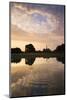 Salisbury Cathedral Spire and a beautiful dawn sky reflected in a rippled pond, Salisbury, Wiltshir-Adam Burton-Mounted Photographic Print