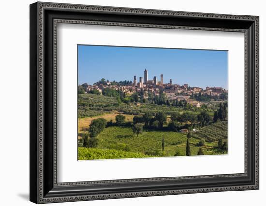 San Gimignano, Siena Province, Tuscany, Italy. Fields surrounding the medieval town famous for i...-null-Framed Photographic Print