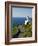 San Sebastian Bay Clifftop Lighthouse with Cyclist Riding Uphill-Christian Kober-Framed Photographic Print