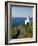 San Sebastian Bay Clifftop Lighthouse with Cyclist Riding Uphill-Christian Kober-Framed Photographic Print